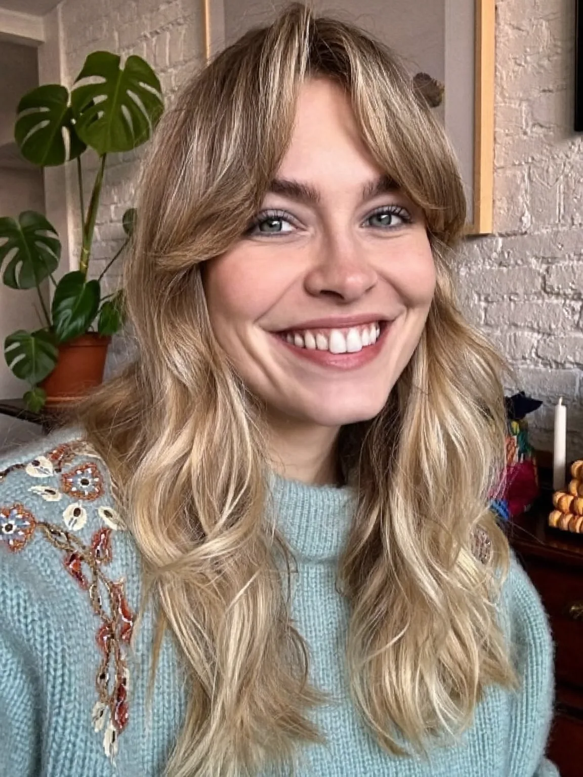 Long Wavy Layers with Soft Sandy Blonde Balayage